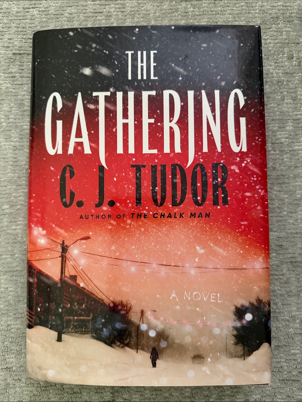 The Gathering by C. J. Tudor - Red Ombre Hardcover Novel
